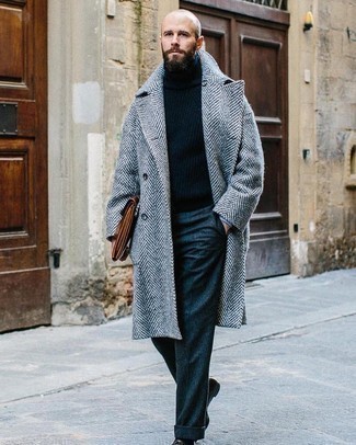 Charcoal Herringbone Overcoat Outfits: When it comes to timeless elegance, this pairing of a charcoal herringbone overcoat and navy wool dress pants doesn't disappoint. Let your sartorial savvy truly shine by complementing your outfit with dark brown leather tassel loafers.