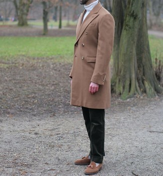 Camel Overcoat Dressy Outfits: Go all out in a camel overcoat and dark green corduroy dress pants. Clueless about how to finish off? Complement this ensemble with brown suede tassel loafers to jazz things up.
