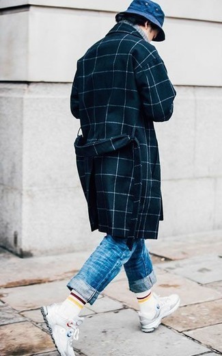 Navy Bucket Hat Outfits For Men: If you're a fan of comfort styling when it comes to fashion, you'll love this relaxed casual combination of a navy check overcoat and a navy bucket hat. For something more on the casually edgy end to finish off your look, introduce a pair of white athletic shoes to the mix.