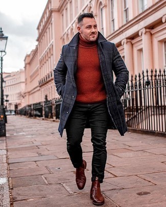 Mustard Knit Wool Turtleneck Outfits For Men: If you're looking for a casual and at the same time dapper ensemble, pair a mustard knit wool turtleneck with black jeans. You can take a classic approach with shoes and complete your outfit with a pair of brown leather chelsea boots.