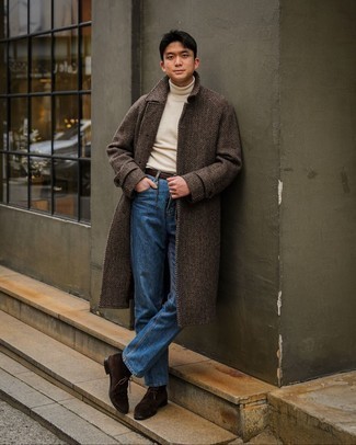 Brown Herringbone Overcoat Outfits: For a look that's super straightforward but can be smartened up or dressed down in many different ways, go for a brown herringbone overcoat and navy jeans. When it comes to footwear, this ensemble is complemented well with dark brown suede desert boots.