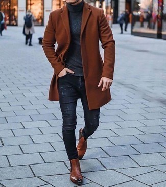 Tobacco Leather Chelsea Boots Outfits For Men: Extremely stylish and practical, this casual combo of a tobacco overcoat and charcoal ripped skinny jeans provides with excellent styling possibilities. Tobacco leather chelsea boots will add a smarter twist to an otherwise mostly dressed-down outfit.