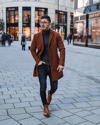 Tobacco Leather Chelsea Boots Outfits For Men: A tobacco overcoat and charcoal ripped skinny jeans are essential in any guy's versatile casual sartorial arsenal. You can get a little creative when it comes to footwear and introduce tobacco leather chelsea boots to the equation.