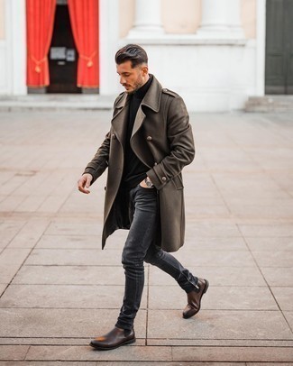 Charcoal Skinny Jeans Outfits For Men: Such staples as a dark brown overcoat and charcoal skinny jeans are the perfect way to infuse subtle dapperness into your casual arsenal. Step up your outfit by finishing off with a pair of dark brown leather chelsea boots.