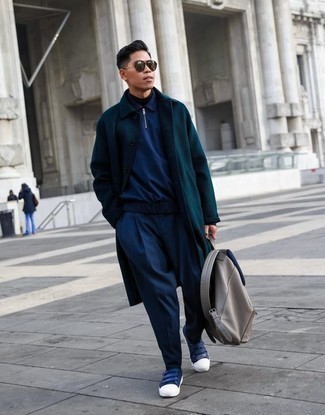 Tan Canvas Backpack Outfits For Men: Go for a teal overcoat and a tan canvas backpack to get a street style and functional ensemble. The whole outfit comes together really well when you complement this getup with a pair of navy and white canvas low top sneakers.
