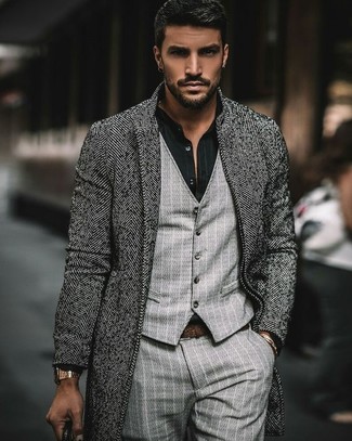 Black Dress Shirt Outfits For Men: Pairing a black dress shirt with grey vertical striped dress pants is an on-point choice for a smart and sophisticated look.