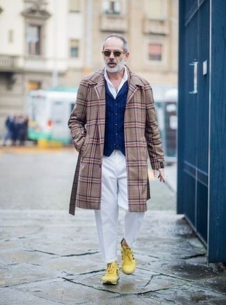 Camel Plaid Overcoat Outfits: Pairing a camel plaid overcoat and white chinos is a surefire way to inject your styling lineup with some manly refinement. Serve a little mix-and-match magic by wearing yellow athletic shoes.