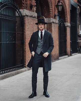 Grey Wool Waistcoat Cold Weather Outfits: Combining a grey wool waistcoat and charcoal dress pants is a fail-safe way to infuse your current repertoire with some rugged elegance. Black leather chelsea boots will add a dressed-down touch to this outfit.