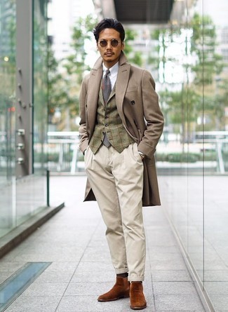 Olive Check Waistcoat Outfits: Pairing an olive check waistcoat and beige chinos is a guaranteed way to inject sophistication into your wardrobe. The whole ensemble comes together if you add tobacco suede chelsea boots to this getup.