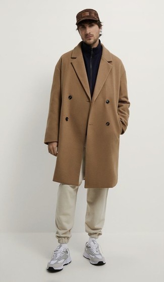 Camel Overcoat Casual Outfits: This combo of a camel overcoat and beige sweatpants is simple, stylish and super easy to replicate. For a more relaxed feel, add grey athletic shoes to the mix.