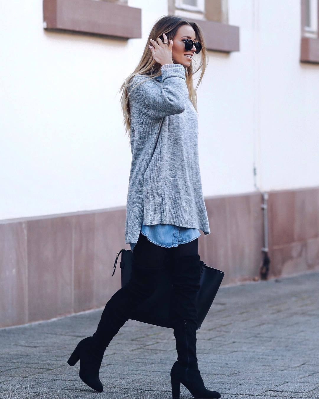 Gigi Hadid looks radiant in a denim shirt and black leggings as she steps  out in