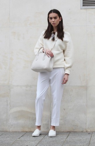 White Slip-on Sneakers Outfits For Women: A white oversized sweater and white dress pants are robust sartorial weapons in any modern girl's sartorial collection. Introduce an easy-going touch to this ensemble by wearing white slip-on sneakers.