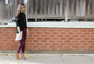 Tan Cutout Leather Ankle Boots Fall Outfits: This laid-back pairing of a black oversized sweater and burgundy corduroy skinny jeans is a foolproof option when you need to look chic but have zero time. If you wish to easily smarten up your ensemble with shoes, introduce a pair of tan cutout leather ankle boots to the equation. It's is an obvious option when it comes to a killer summer-to-fall ensemble.