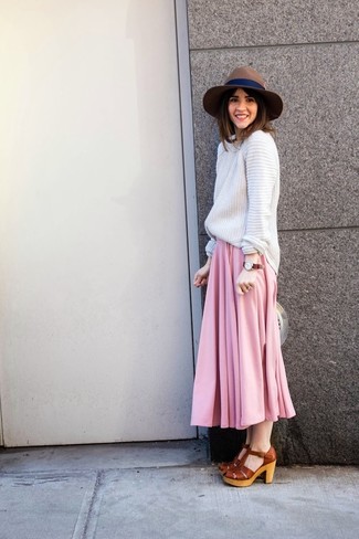 White Knit Oversized Sweater Outfits: For a winning relaxed option, you can never go wrong with this combo of a white knit oversized sweater and a pink pleated maxi skirt. To give this getup a more sophisticated feel, complement your outfit with a pair of brown chunky leather heeled sandals.