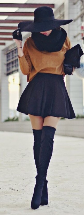 Tobacco Oversized Sweater Outfits: This combo of a tobacco oversized sweater and a black skater skirt is very easy to put together and so comfortable to sport over the course of the day as well! Black suede over the knee boots will bring a more elegant twist to an otherwise utilitarian ensemble.