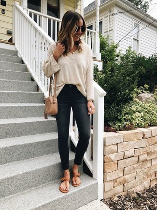 Women's Beige Oversized Sweater, Black Skinny Jeans, Brown Leather Thong Sandals, Tan Leather Crossbody Bag