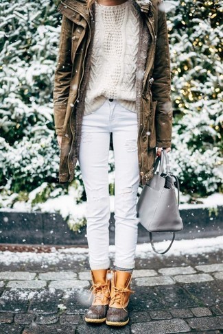 Tobacco Parka Outfits For Women: This combo of a tobacco parka and white ripped jeans is pulled together and yet it's easy enough and ready for anything. A pair of tan snow boots is a surefire footwear option here that's full of personality.