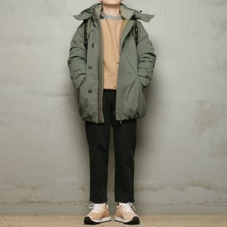 Olive Parka Outfits For Men: For a cool and casual ensemble, go for an olive parka and black chinos — these two pieces work brilliantly together. If you need to immediately tone down your ensemble with footwear, why not complement this look with tan athletic shoes?