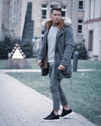 Grey Lightweight Parka Outfits For Men: When you need to feel confident in your getup, make a grey lightweight parka and grey chinos your outfit choice. A pair of black canvas low top sneakers acts as the glue that brings this outfit together.