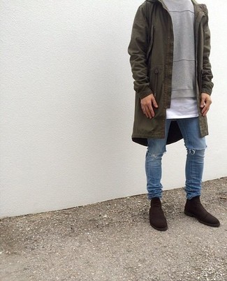 Olive Lightweight Parka Outfits For Men: This bold casual combo of an olive lightweight parka and blue ripped jeans is super easy to pull together without a second thought, helping you look awesome and prepared for anything without spending a ton of time combing through your closet. Want to break out of the mold? Then why not complete your look with dark brown suede chelsea boots?