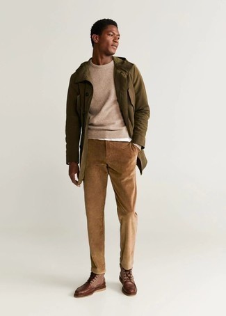 Olive Parka Outfits For Men: This off-duty pairing of an olive parka and khaki corduroy chinos is very easy to pull together in no time flat, helping you look awesome and ready for anything without spending too much time searching through your wardrobe. To introduce some extra flair to this look, introduce a pair of brown leather casual boots to this look.