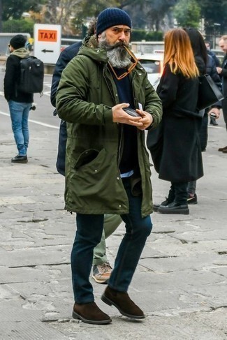 Blue Beanie Outfits For Men: Putting together an olive parka and a blue beanie will allow you to showcase your skills in menswear styling even on dress-down days. If you want to effortlessly up your outfit with shoes, why not opt for a pair of dark brown suede chelsea boots?