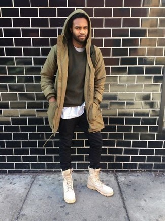 Tan Parka Outfits For Men: Go for a tan parka and black jeans for a casual street style and fashionable look. A pair of beige canvas work boots instantly turns up the cool of your outfit.