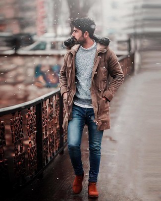 Brown Parka Outfits For Men: A brown parka and navy skinny jeans are the kind of a fail-safe casual getup that you need when you have no time to craft a look. Why not complete this getup with orange suede chelsea boots for a dose of sophistication?