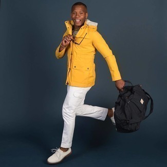 White Cargo Pants Outfits: Go for something contemporary with a mustard parka and white cargo pants. Parade your classy side by finishing off with a pair of white canvas derby shoes.