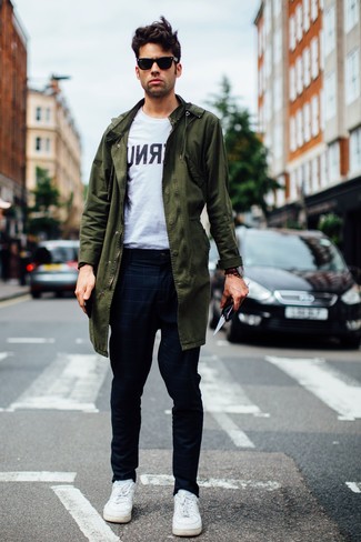 Navy Check Chinos Outfits: We're all scouting for comfort when it comes to styling, and this casual combination of an olive parka and navy check chinos is a good illustration of that. Complement this getup with a pair of white leather low top sneakers and you're all set looking smashing.