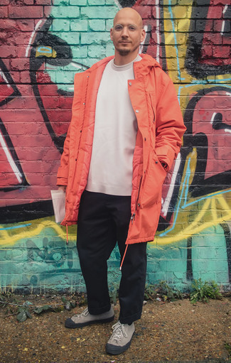 Orange Parka Outfits For Men: Pair an orange parka with black chinos for a hassle-free look that's also put together. Complement your look with grey canvas low top sneakers and ta-da: this getup is complete.