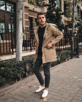 Beige Parka Outfits For Men: A beige parka and charcoal jeans are a must-have casual pairing for many stylish gentlemen. Let your styling sensibilities really shine by finishing off this ensemble with white canvas low top sneakers.