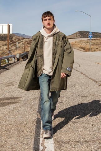 Olive Lightweight Parka Outfits For Men: We say a big yes to this contemporary combo of an olive lightweight parka and blue jeans! If you don't know how to finish, a pair of beige canvas low top sneakers is a fail-safe option.