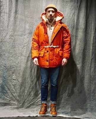 Orange Parka Outfits For Men: An orange parka and navy jeans are an easy way to inject played down dapperness into your daily off-duty lineup. And if you want to effortlessly dial down this outfit with footwear, complement this outfit with a pair of tobacco leather work boots.