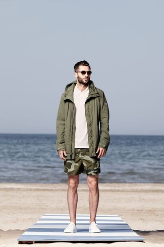 Dark Green Parka Outfits For Men: Who said you can't make a fashion statement with a relaxed outfit? That's easy in a dark green parka and olive camouflage shorts. Introduce a pair of white plimsolls to the mix for an instant dressy look.