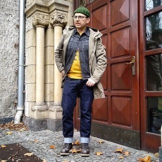 Tan Parka Outfits For Men: For an edgy ensemble without the need to sacrifice on practicality, we turn to this combination of a tan parka and navy jeans. Put an elegant spin on your getup with dark brown leather casual boots.