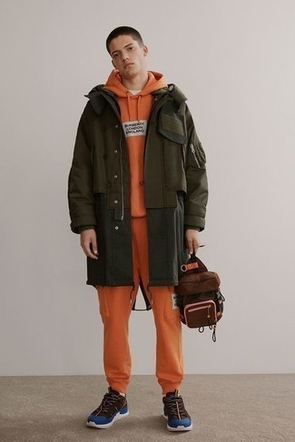 Men's Olive Parka, Orange Track Suit, Dark Brown Athletic Shoes, Brown Canvas Backpack