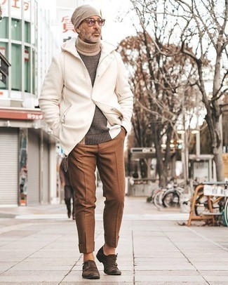 White Parka Outfits For Men: This classic and casual combo of a white parka and brown dress pants is extremely easy to put together without a second thought, helping you look awesome and prepared for anything without spending too much time combing through your wardrobe. Let your outfit coordination prowess truly shine by rounding off your outfit with dark brown suede double monks.