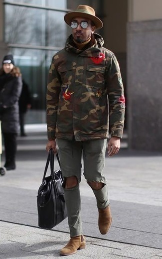 Olive Camouflage Parka Outfits For Men: You'll be surprised at how super easy it is for any guy to put together a modern casual outfit like this. Just an olive camouflage parka married with olive ripped jeans. You could perhaps get a little creative with footwear and lift up this ensemble by rocking tan suede chelsea boots.