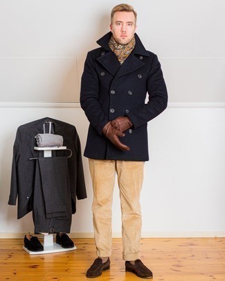 Scarf Outfits For Men: You'll be surprised at how easy it is for any man to get dressed this way. Just a navy pea coat and a scarf. To introduce a little fanciness to your outfit, complete this outfit with a pair of dark brown suede loafers.