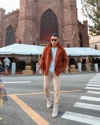 Gold Coat Outfits For Men: For an effortlessly neat getup, dress in a gold coat and beige chinos — these items go beautifully together. A pair of beige suede chelsea boots will take your outfit a classier path.