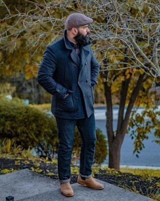 Pea Coat Outfits: Marry a pea coat with navy jeans to achieve an interesting and modern-looking outfit. Want to dial it up in the footwear department? Complete your ensemble with a pair of brown suede chelsea boots.