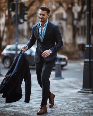 Grey Suit with Denim Shirt Chill Weather Outfits: For a look that's classy and gasp-worthy, wear a grey suit and a denim shirt. Go off the beaten track and switch up your ensemble by rounding off with brown leather brogue boots.