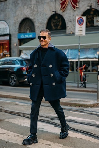 Pea Coat Outfits: The pairing of a pea coat and navy chinos makes for a really put together ensemble. If you wish to instantly dial down this outfit with a pair of shoes, enter black leather desert boots into the equation.
