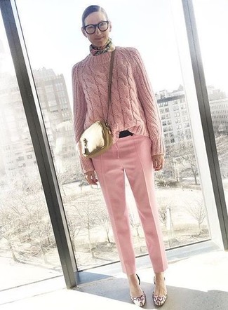 Marrying a pink cable sweater with pink dress pants is an on-point option for a casually cool look. To give your overall look a more elegant vibe, introduce pink leather pumps to the equation.