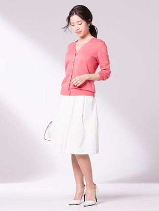 Pink Cardigan Outfits For Women: This pairing of a pink cardigan and a white full skirt is impeccably stylish and yet it looks functional enough and ready for anything. A pair of white leather pumps integrates seamlessly within a ton of combos.