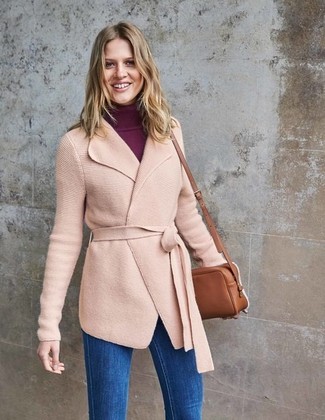 Pink Coat Outfits For Women: A pink coat and blue skinny jeans will allow you to showcase your fashion-savvy side.