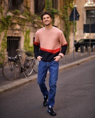 White and Pink Crew-neck Sweater with Blue Jeans Outfits For Men: Putting together a white and pink crew-neck sweater with blue jeans is a comfortable and stylish option. Complete your ensemble with black print leather low top sneakers and ta-da: this outfit is complete.