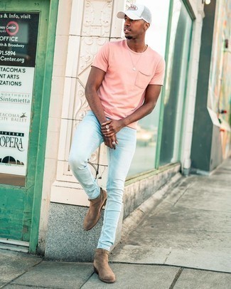 White Print Baseball Cap Outfits For Men: Try teaming a pink crew-neck t-shirt with a white print baseball cap for an ensemble that's both street style and functional. Got bored with this outfit? Invite brown suede chelsea boots to jazz things up.