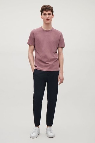 Pink Crew-neck T-shirt Outfits For Men: Try teaming a pink crew-neck t-shirt with navy chinos for a functional ensemble that's also well put together. On the footwear front, this look is rounded off perfectly with white leather low top sneakers.